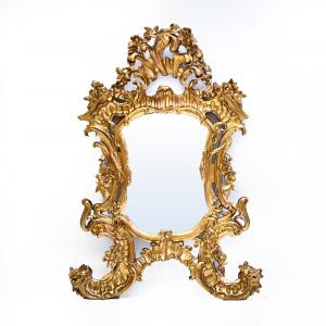 Antique Louis XV gilded wood mirror, 19th century era.