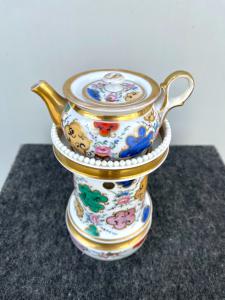 Porcelain night light-teapot with floral and geometric decoration and gold highlights. France