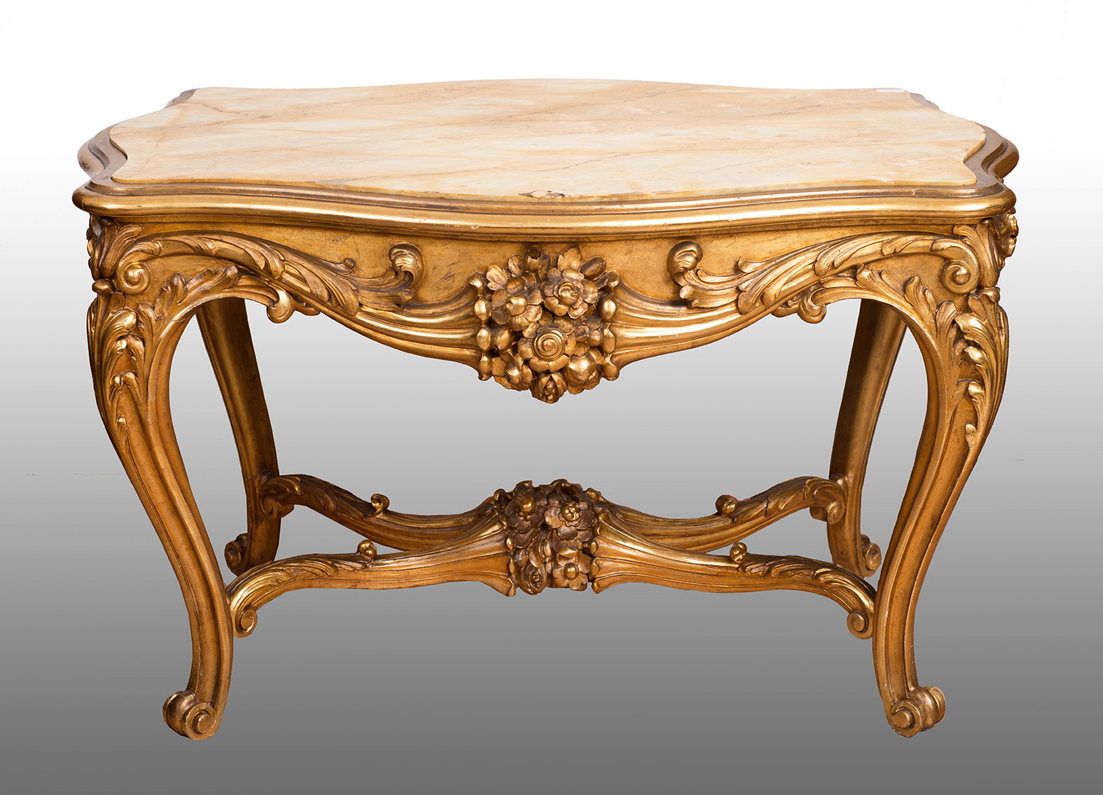 Mesa de centro em madeira dourada e esculpida com tampo em ônix, Napoleão III francês. Período do século XIX.