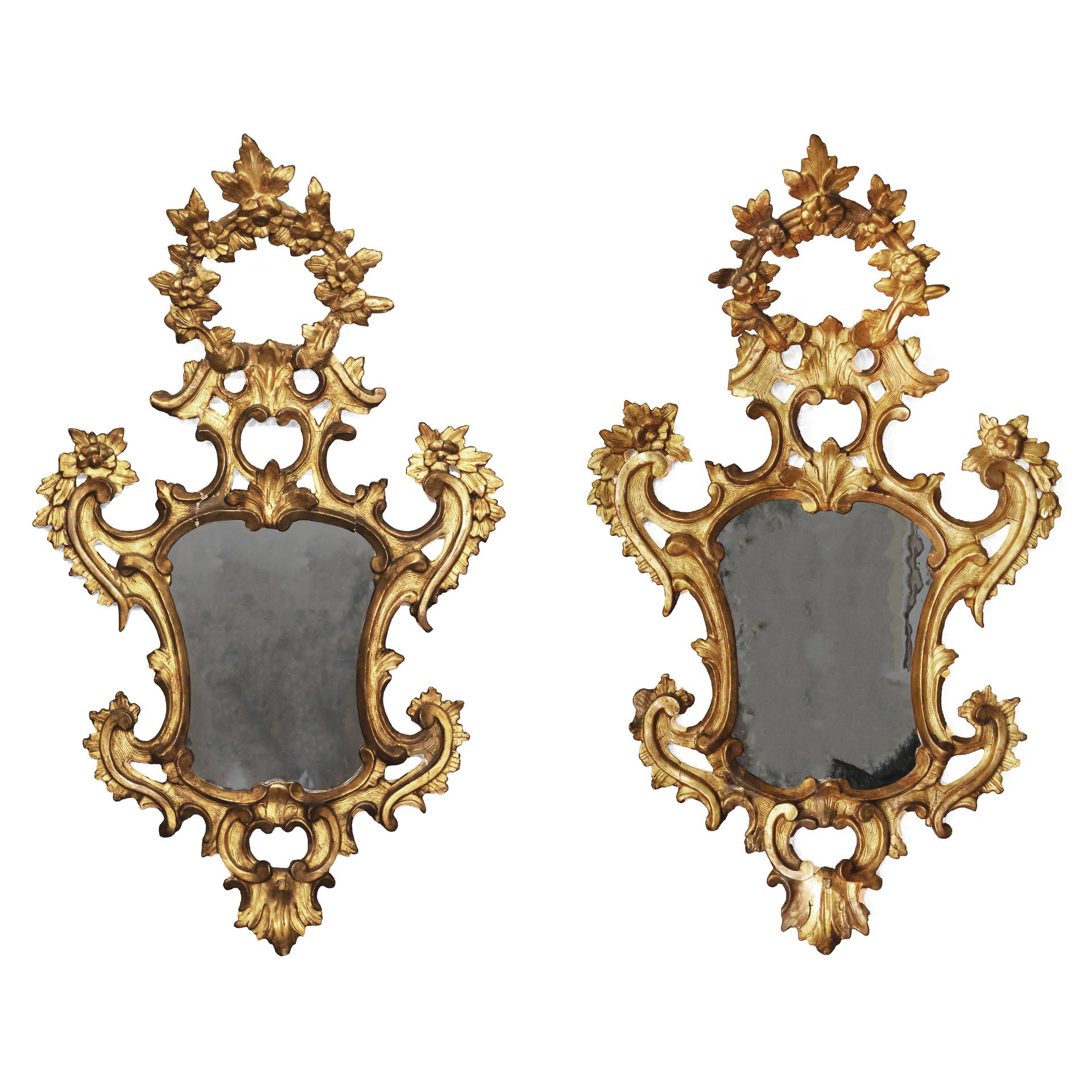 Pair of carved and gilded wooden mirrors. Veneto, 18th century