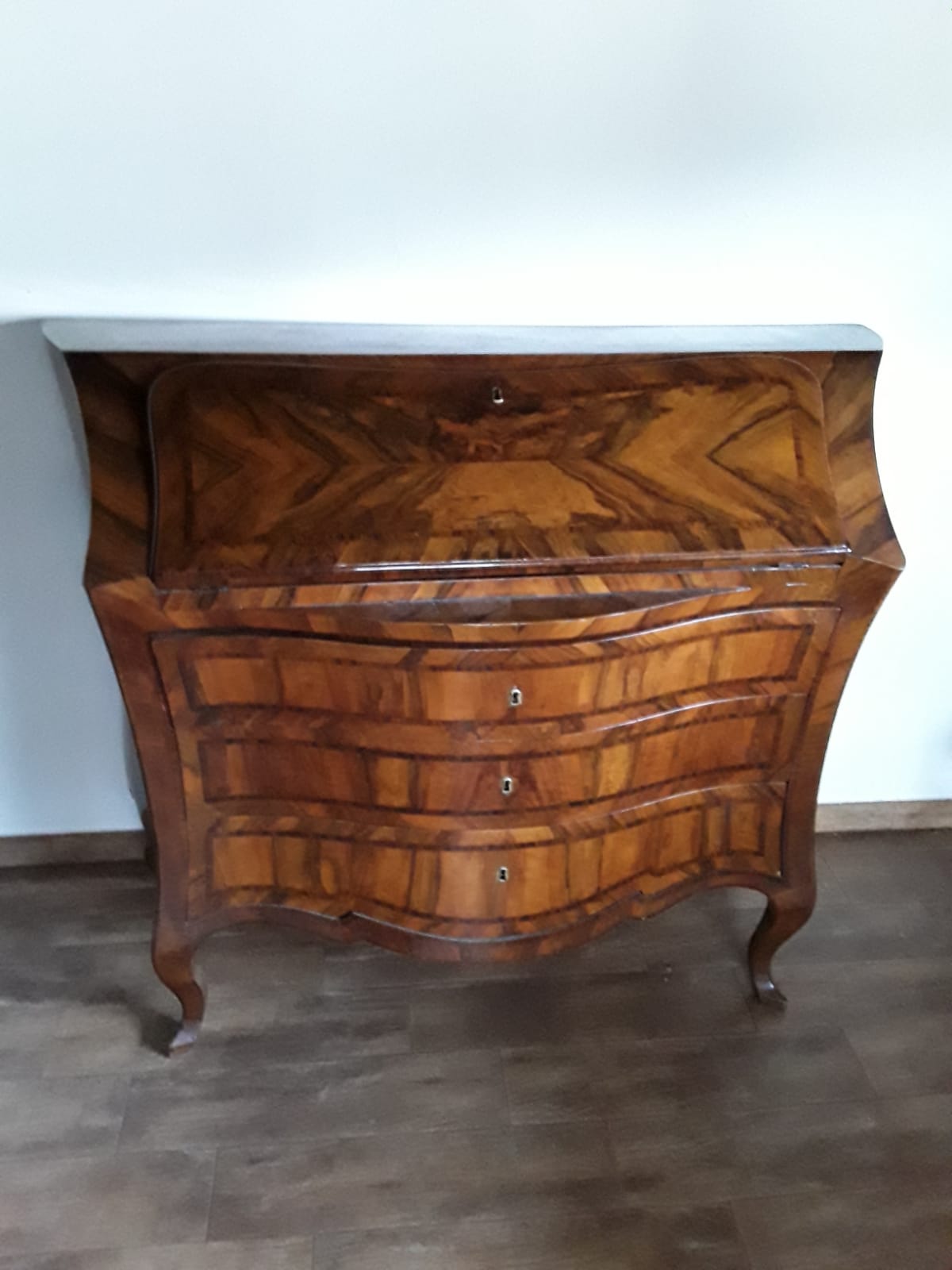 Sienese drop-front desk with a crossbow-shaped front, olive burl veneer with rosewood inlay, horizontally and vertically curved, a rare drop-front desk that is hard to find on the market, with secret compartments inside. Dimensions: 135x51x110 cm (width x