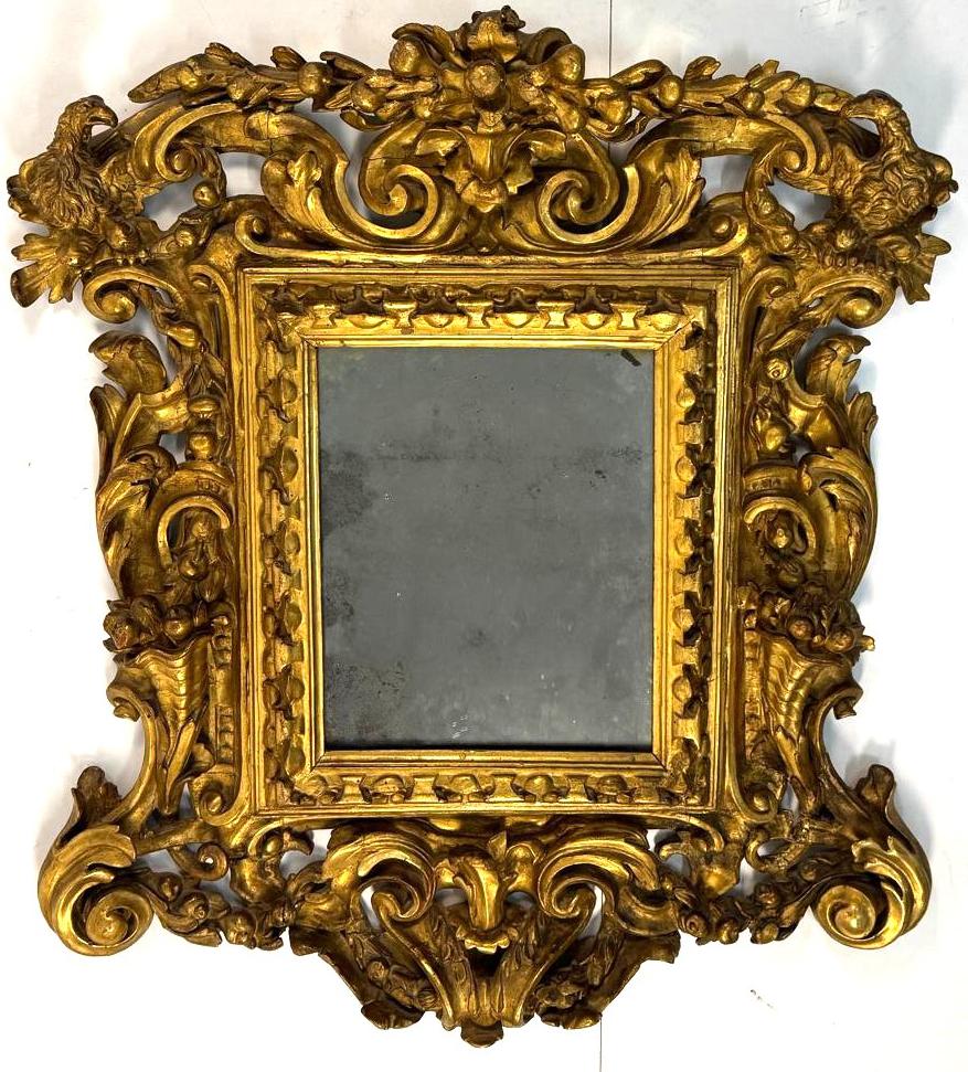 Specchiera in legno scolpito, intagliato e dorato, Toscana, inizi del XVIII secolo