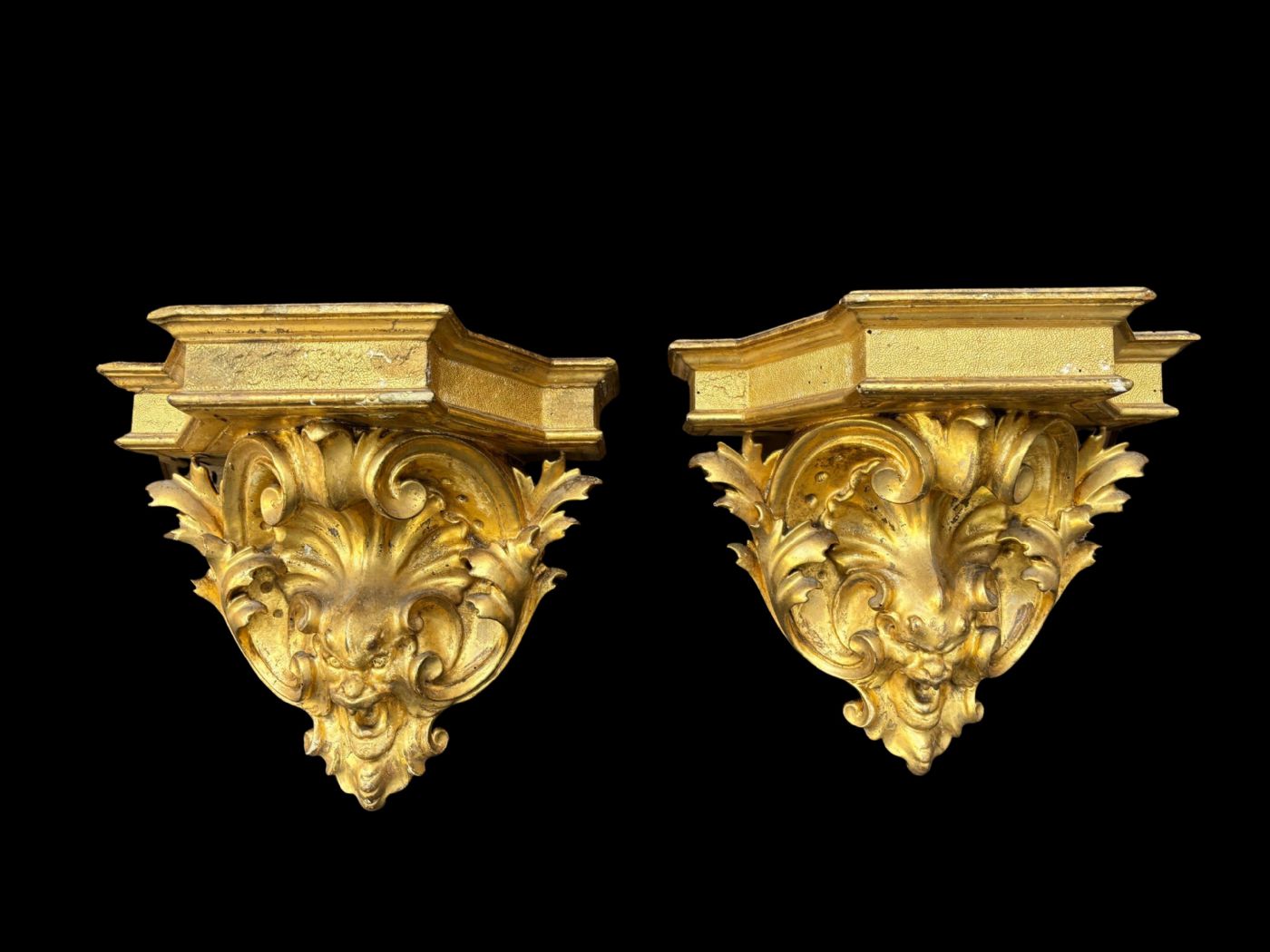 Pair of carved and gilded wood corbels