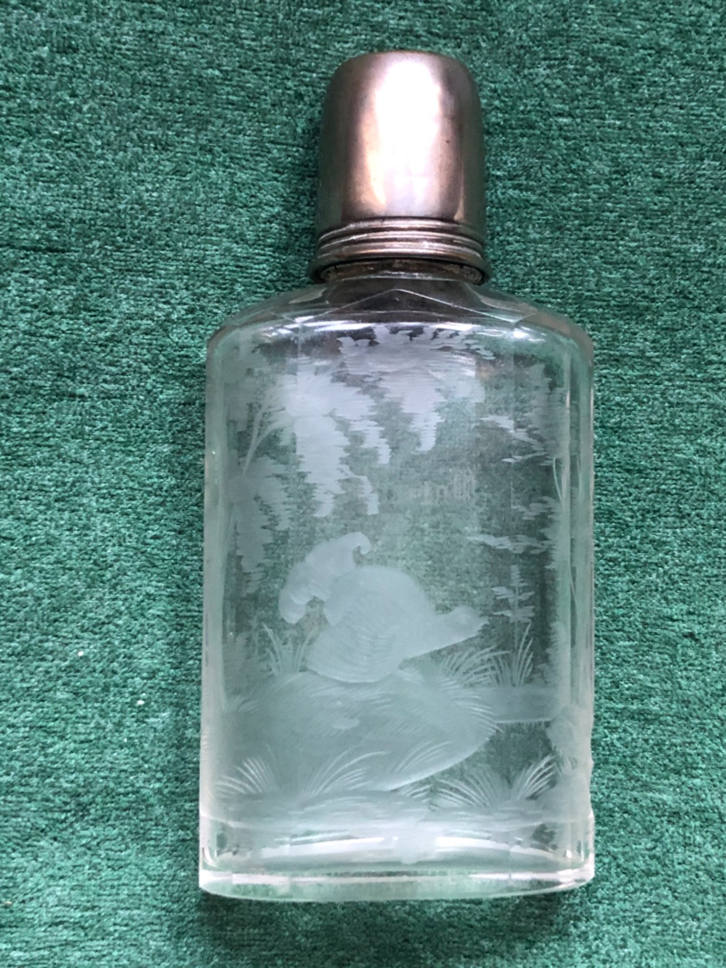 Ground transparent crystal 'travel' liquor bottle with a wood grouse scene. Bohemia.