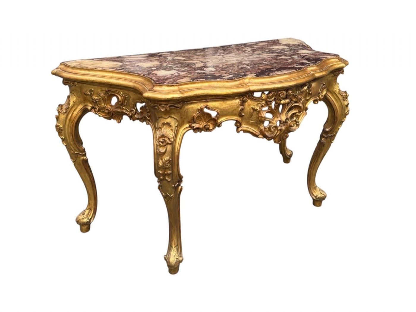 Splendid console table in gilded and carved wood, curved on the front and sides, with a marble top. VENICE 18th Century