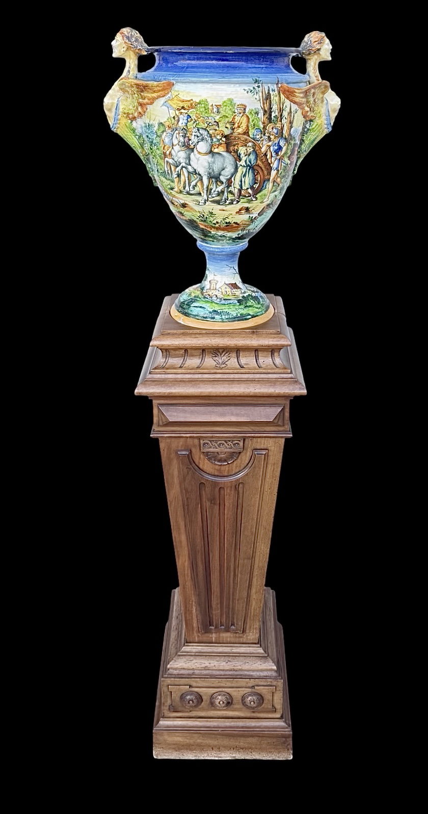 Large majolica vase with historiated decoration and wooden column. Molaroni, Pesaro.