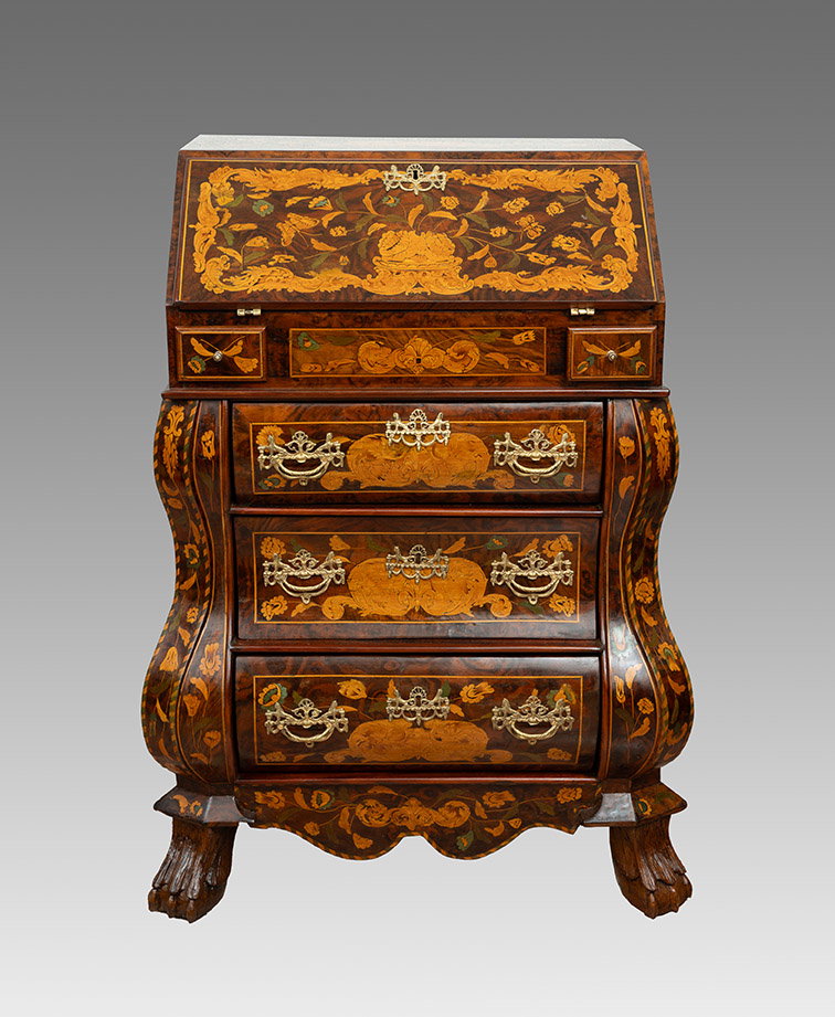 Antique Dutch drop-front desk in fine woods from the early 19th century.