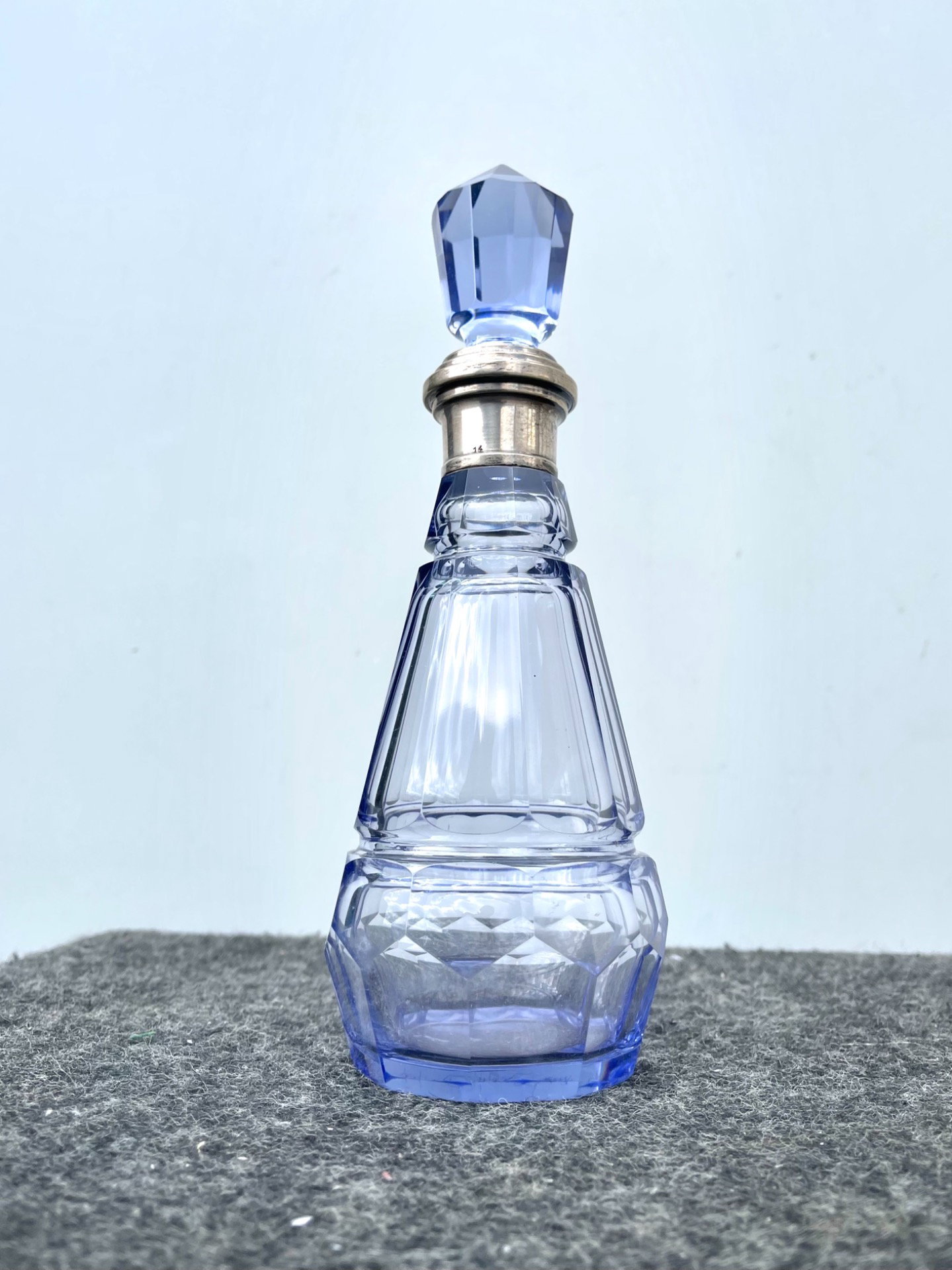 Art Deco style cut and faceted glass bottle with silver neck. Italy.