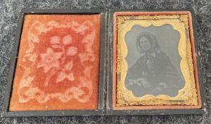Daguerreotype in original container with female figure.