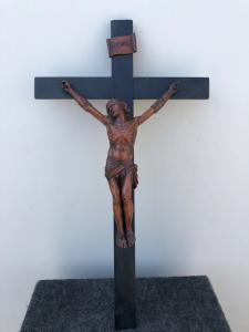 Boxwood Christ on ebonized cross.