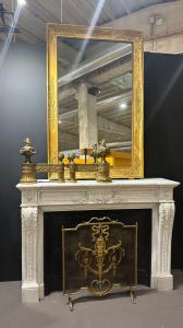 Neoclassical fireplace with cast iron reducer