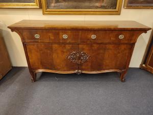 Sideboard with curved sides