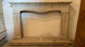 18th-century fireplace in yellow stone
