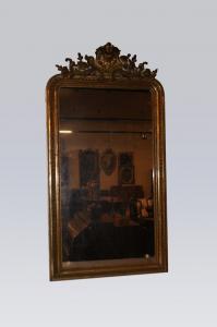 Specchiera francese stile Luigi XVI di metà 1800 dorata foglia oro con bellissima cimasa