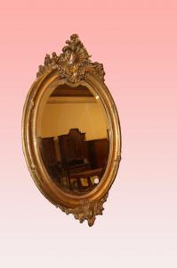 Graziosa specchiera ovale con cimasa francese del 1800 stile Luigi XV