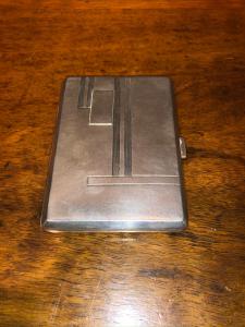 Silver cigarette case engraved with Art Deco geometric decorations. Italy.