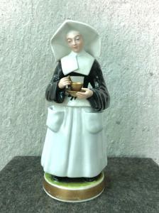 Porcelain night light teapot depicting a nun. France. Louis Philippe period.