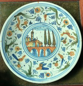 Majolica plate with calligraphic decoration and architecture. Faenza