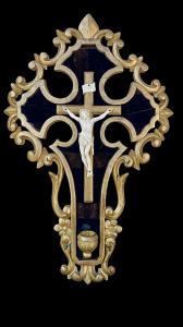 Ivory Christ on frame-stoup in carved wood and gold leaf with rocaille and floral motifs.