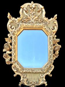 Carved and gilded wooden frame - mirror with floral and rocaille motifs. Directoire period.