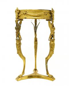 19th century, Tripod stand with winged sphinx supports on feline paws