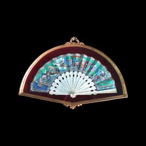 Fan with pierced ribs and painted paper panache. China.