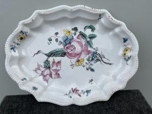 Majolica plate decorated with a rose design. Giacomo Boselli Manufacture. Savona.