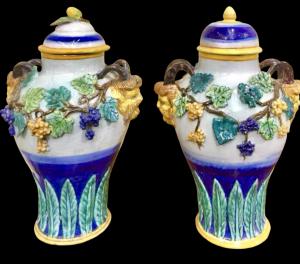 Pair of maiolica vases with vine and plant motifs in relief. Imola manufacture.