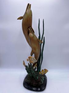 Delfini in bronzo