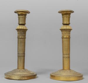 Pair of Charles X gilt bronze candlesticks, early 19th century