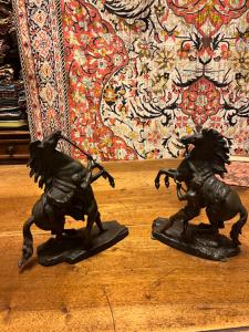 Pair of bronze horses signed Guillaume Cousteau, 19th century.