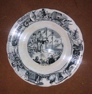 Earthenware plate with circus-themed decal decoration. Choisy le Roy manufacture. France
