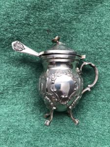 Silver gravy boat with geometric and rocaille motifs. France.
