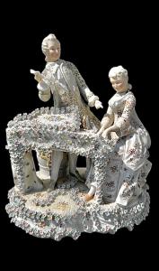 Gruppo in porcellana policroma figura maschile e femminile con teste oscillanti.Saxe.Germania.