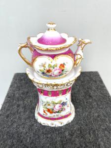 Porcelain veilleuse-tisaniere with rocaille motifs and floral decoration highlighted in gold. France