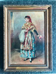 Pintura a óleo sobre tela retratando figura feminina em traje típico. França.