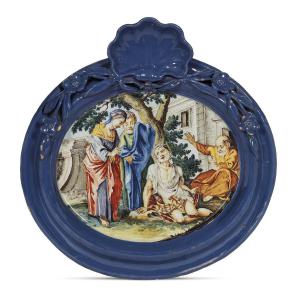 Placca in maiolica policroma di forma ovale con cornice, Savona secolo XVIII