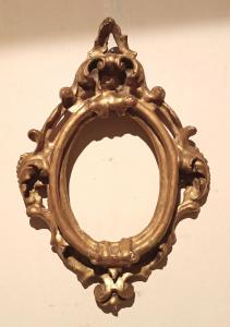 Cornice antica ovale dorata e intagliata Luigi XIV -Toscana XVII secolo