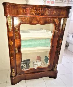 Small one-door cabinet.