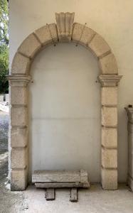 Yellow stone round arch doorway