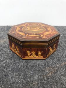 Octagonal thuja burl box with inlays depicting festoons and scenes of cherubs. Sorrento.
