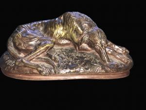 Bronze sculpture on a marble base depicting a sleeping greyhound. Signed Joseph Raymond Gayard (1807-1855) and dated 1848. France.