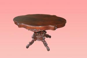 Tavolino sagomato francese stile Luigi Filippo del 1800 in legno di mogano con cassetto e basamento intaglaito