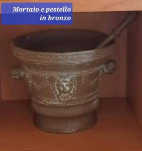 MORTAIO E PESTELLO IN BRONZO