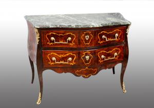 French Louis XV chest of drawers in precious exotic woods with marble top. 18th century.
