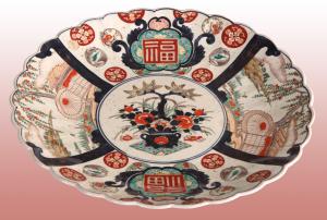 Richly decorated 19th-century Japanese Imari porcelain plate