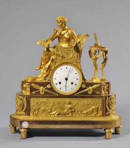 Relógio de bronze dourado representando uma jovem com pomba, França, período de Carlos X, 1820-1830