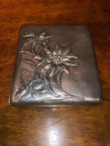 Art-nouveau silver cigarette case with floral decoration. Italy.
