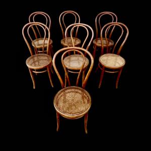 Seven Thonet-style beech chairs, signed: Josias Eissler & Söhne. Austria.