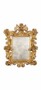 Favolosa specchiera a cartoccio in legno dorato.EMILIA XVIII secolo.